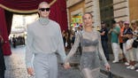 Norwegian soccer star Erling Haaland holds hands with girlfriend Isabel Haugseng Johansen