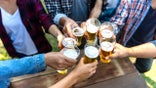 Friends toasting with beer
