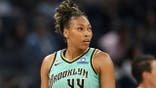 Betnijah Laney-Hamilton throws Jonquel Jones' shoe down the court, accidentally striking Marina Mabrey during Sunday's WNBA game.