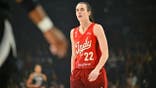 Caitlin Clark looks on from the court during the Indiana Fever's game against the Las Vegas Aces in Las Vegas.