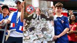 France fans hold up a banner featuring FIFA President Gianni Infantino