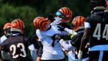 Ja'Marr Chase confronts DJ Turner II during Cincinnati Bengals training camp.