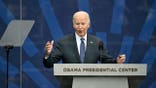 Joe biden speaking at podium
