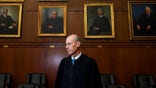 Judge James E. Boasberg, chief judge of the Federal District Court in DC, stands for a portrait at E. Barrett Prettyman Federal Courthouse in Washington, DC on March 16, 2023. (Photo by Carolyn Van Houten/The Washington Post via Getty Images)