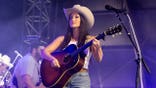 Kacey Musgraves cowboy hat, guitar