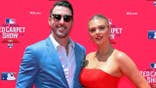 Justin Verlander poses with Kate Upton on a red carpet.