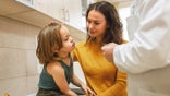 Mother with child at doctor appointment