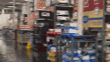 BJ's store flooded with debris everywhere after part of the roof collapsed