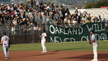 Oakland Ballers fans stand together.