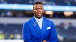 Ryan Clark stands on set before the game at SoFi Stadium in Inglewood, Calif.