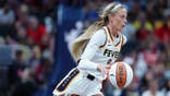 Sophie Cunningham brings the ball up court against the Connecticut Sun.