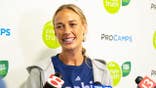 Sophie Cunningham speaks with reporters at a basketball camp in Carmel, Indiana.