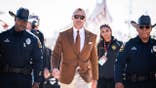 Steve Sarkisian walks into Camping World Stadium ahead of the Citrus Bowl.