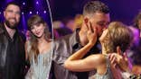 Taylor Swift and Travis Kelce pose for a photo together, share a kiss at 2026 iHeartRadio Music Awards