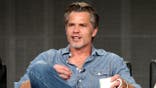 Timothy Olyphant speaks onstage during the Justified panel discussion at the Television Critics Association press tour.