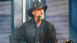 Trace Adkins performing at the Opry 100 Honors Charlie Daniels concert in Nashville in July 2025.