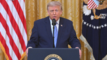 President Donald Trump speaks into a microphone while delivering a White House remarks on July 16, 2026.