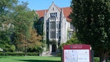 University of Chicago sign with campus map