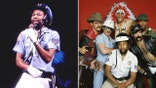 Victor Willis performs onstage during a Village People concert at Chicago Stadium.