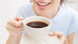 Woman drinking coffee