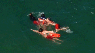 WATCH: Felony suspect's ocean getaway unravels after 90-minute standoff with lifeguards