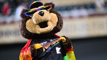Little girl covers her eyes as baseball team pulls off scripted LGBT kiss - Fox News