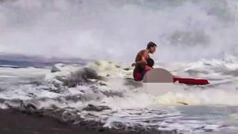 Father speaks out after rookie lifeguard dove into brutal waves to save drowning son - Fox News