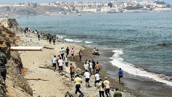 State Department raises travel warning for part of Spain as migrant surge sparks military deployment