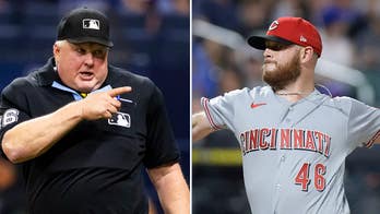 Cincinnati Reds pitcher rips 'f—ing fata–' umpire for getting in defender's way on ground ball