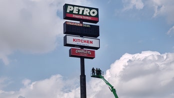 Illinois worker spent over six hours trapped in gas station sign too tall for fire truck ladders to reach