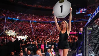 Sophie Cunningham kicks off her shoes and walks the Octagon at UFC 329 as a surprise ring girl
