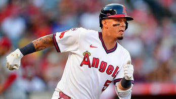 Angels third baseman brings basketball onto the diamond, turns slick double play with unconventional move