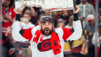 Hurricanes player William Carrier fills the Stanley Cup full of a Quebecois delicacy