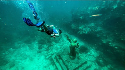 Divers scrub famed Christ of the Abyss statue during annual underwater cleanup - Fox News