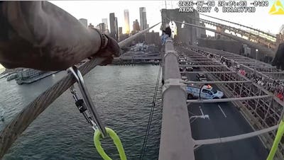 NYPD officers SAVE woman threatening to JUMP from Brooklyn Bridge - Fox News
