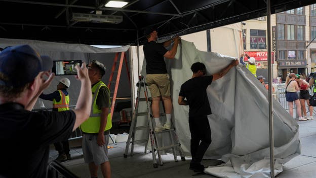 Workers set up a tent outside Madison Square Garden, ahead of Taylor Swift and Travis Kelce's reported wedding