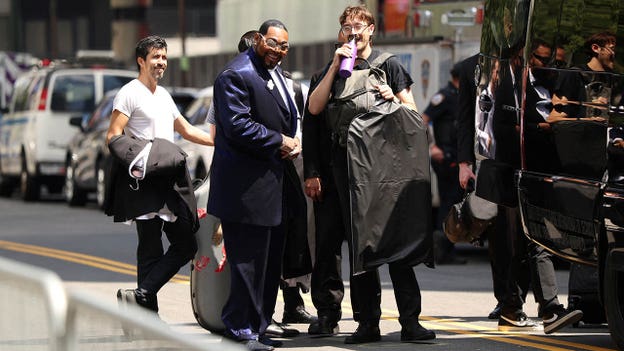 Musicians are seen arriving outside Madison Square Garden for Taylor Swift's reported wedding