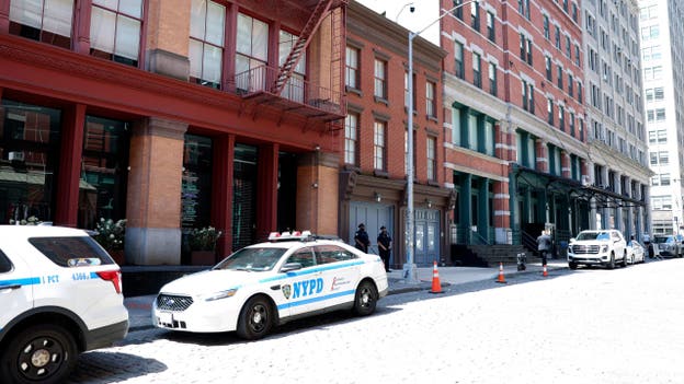 NYPD cars and two officers outside of Taylor Swift's Tribeca home on July 3