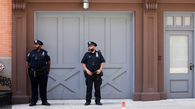Police seen outside Taylor Swift's NYC home hours before reported wedding