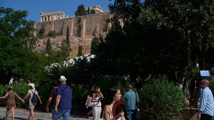 American tourists stabbed outside Athens' Acropolis as police detain suspect in apparent random attack