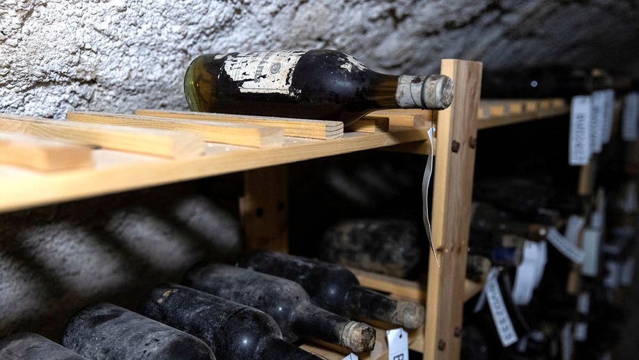 Secret cache of 130-year-old wine uncovered beneath medieval castle chapel floor