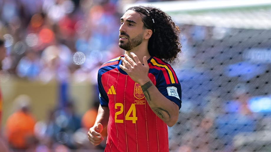 Spanish soccer player makes good on his promise to get tattoo of team's manager after World Cup win