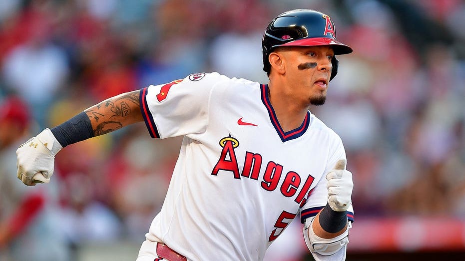 Angels third baseman brings basketball onto the diamond, turns slick double play with unconventional move