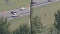 Ohio man fleeing police on foot leaps onto moving car, tries to take control before falling off: Police - Fox News