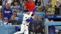 Dodgers star Freddie Freeman takes scary tumble down dugout steps trying to catch pop fly - Fox News