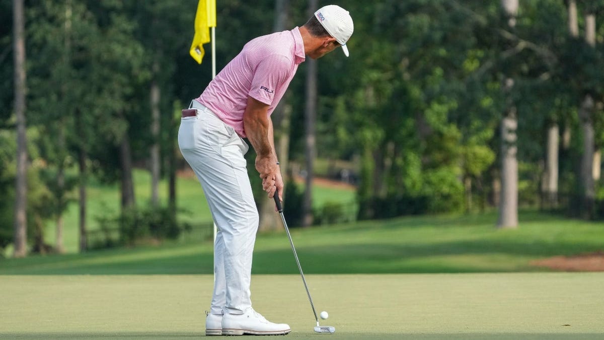 Billy Horschel putts for birdie during the final round of the 2024 Wyndham Championship at Sedgefield Country Club in Greensboro, North Carolina.