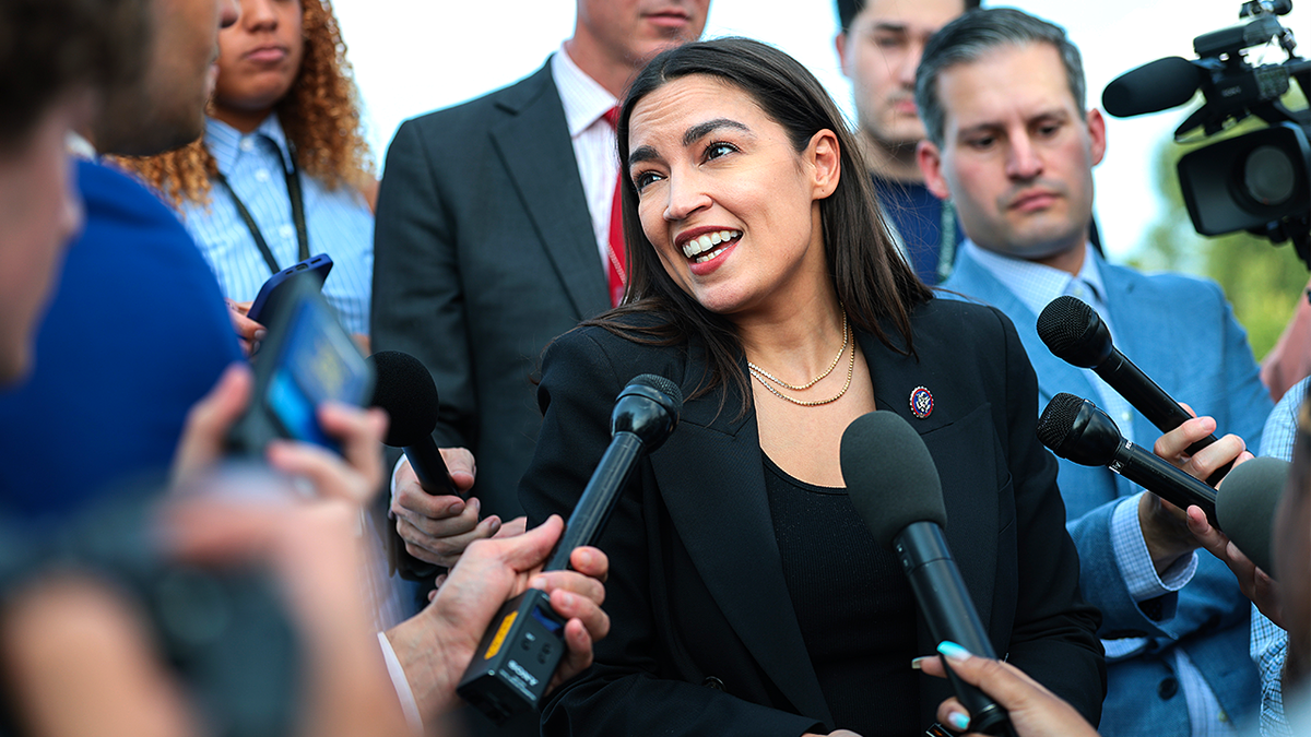 Rep. Alexandria Ocasio-Cortez speaks to reporters outside U.S. Capitol.