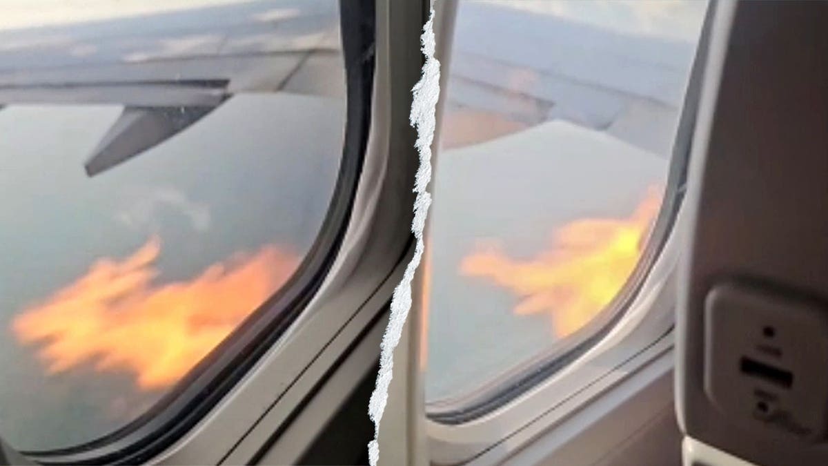 Burst of flames coming out of American Airlines plane