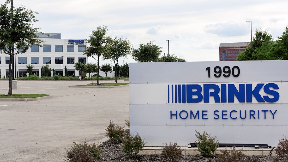Front presumption    of the Brinks Home gathering  and sign.