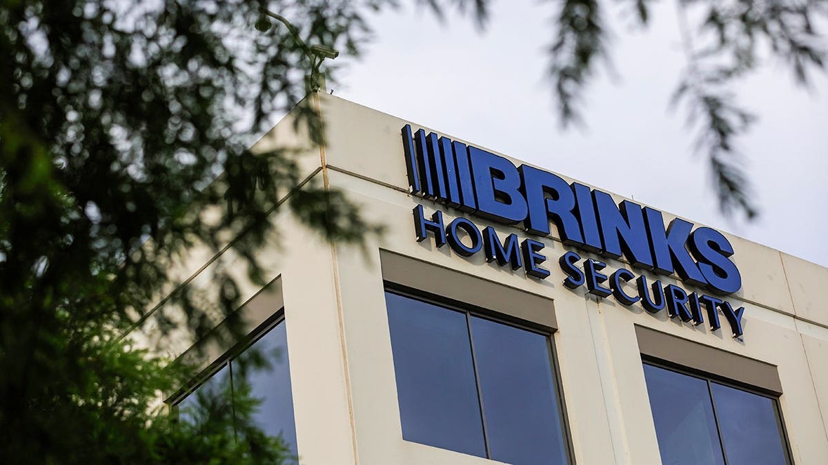 Brinks Home logo connected  a building.